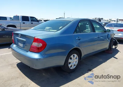 2002 Toyota Camry Le from USA, damaged, VIN 4T1BE30K72U586037